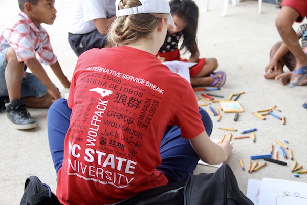 NC State students working with children