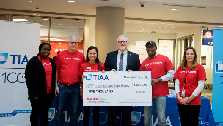TIAA gives a donation in support of Giving Tuesday