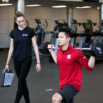 NC State student working with a personal trainer