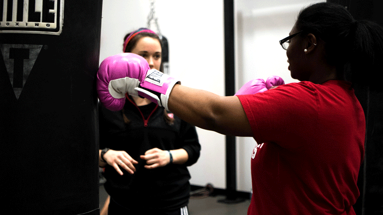 Students taking boxing class
