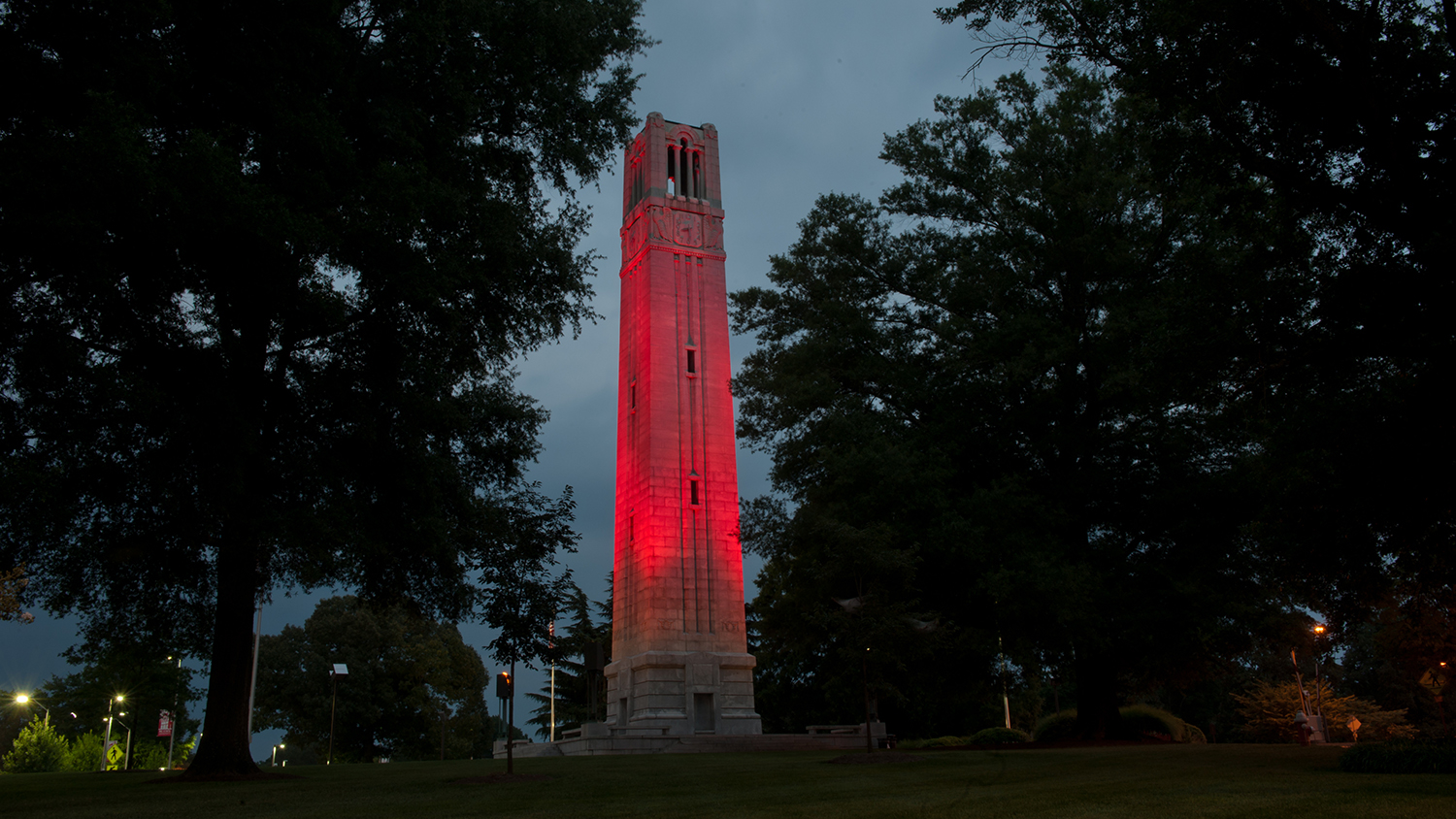 Belltower lit red at night
