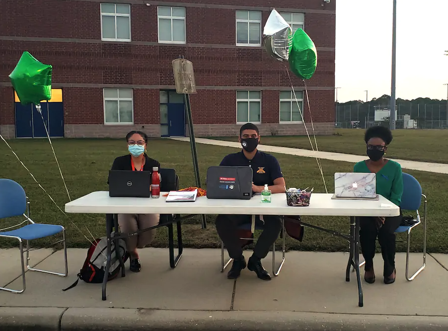 CAC counselors at an outside table
