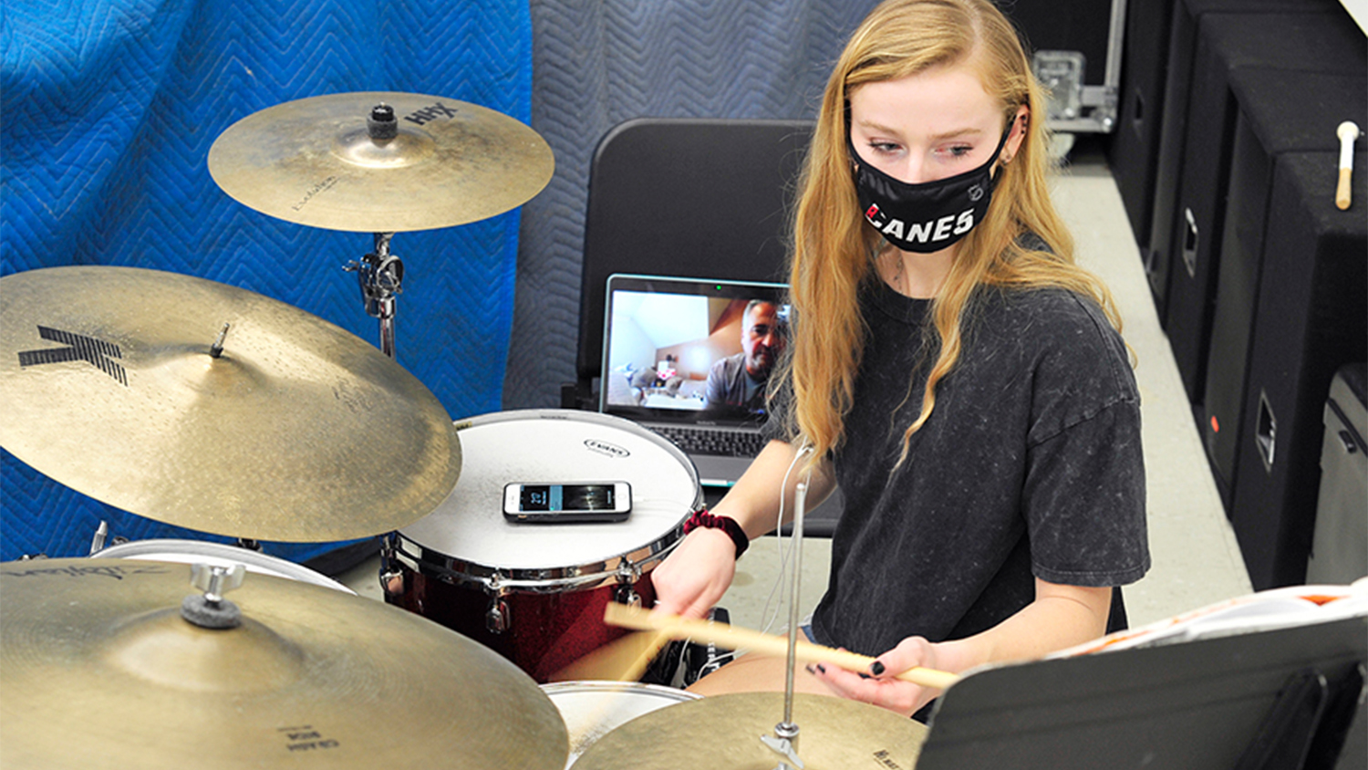 Percussion performance minor AnnE Ford attends her online drum lesson with Dr. Paul Garcia from a practice and recording space set up in Price Music Center for local students to use as needed during the fall 2020 semester of online courses. Photo by Erin Zanders.
