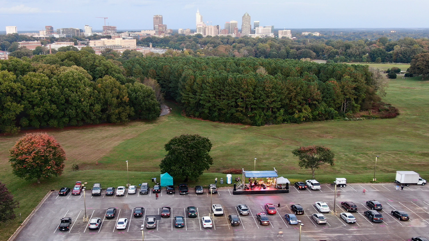 Vehicles in the parking lot on Centennial Campus for the Rissi Palmer drive-in concert this fall