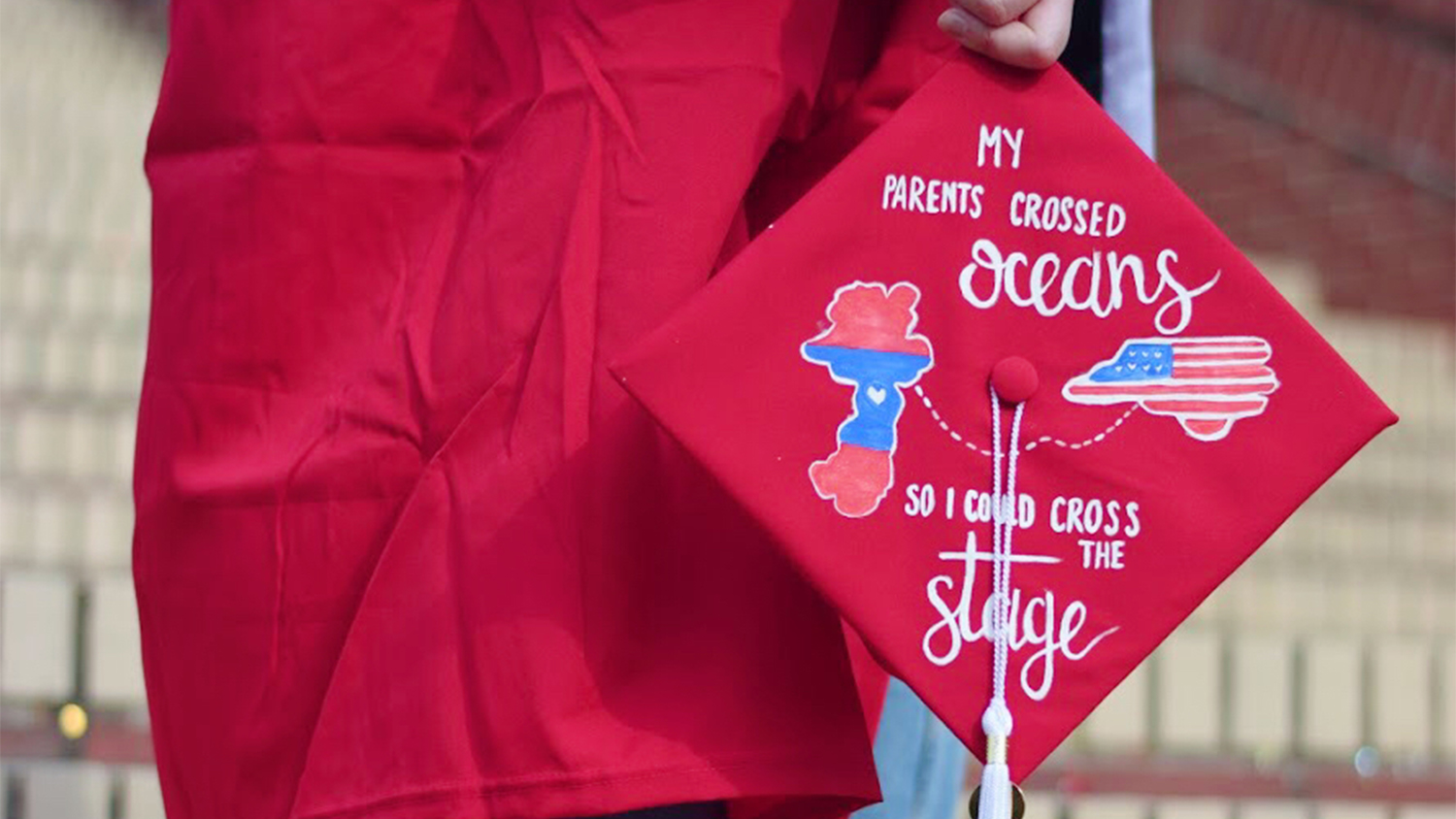 A graduation cap that reads "My grandparents crossed oceans so I could cross the stage"