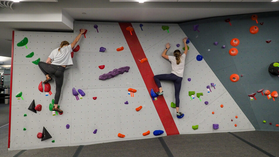 Students practice climbing and bouldering during the COVID-19 pandemic at the newly renovated Carmichael gym. Photo by Marc Hall