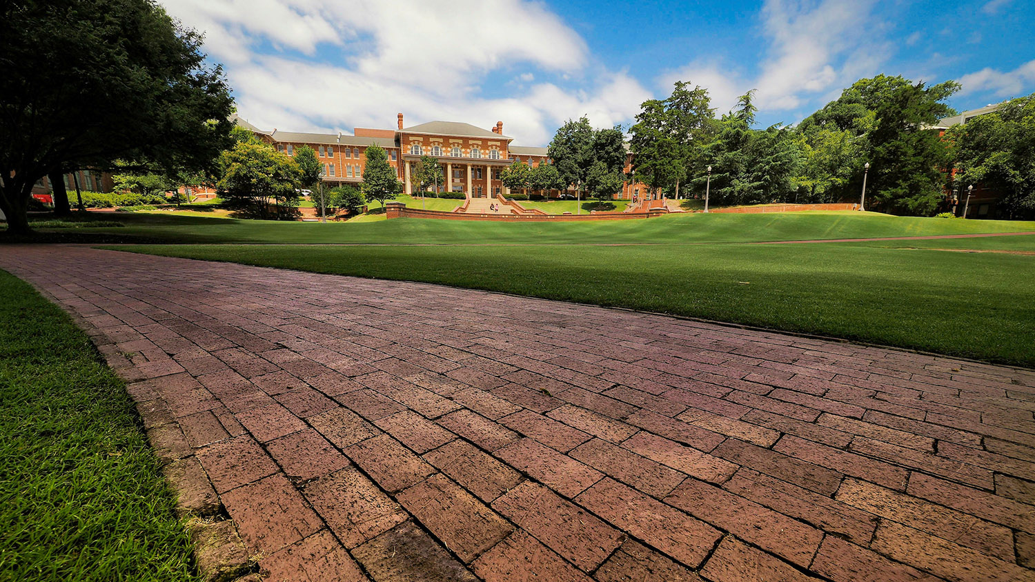 Close-up of brick path with the Court of Carolina in the background