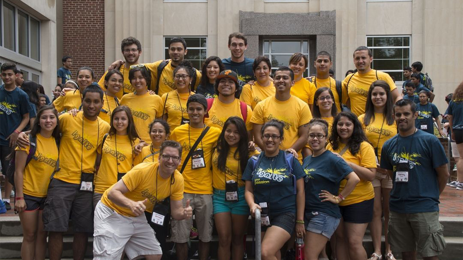 A group of students in yellow shirts