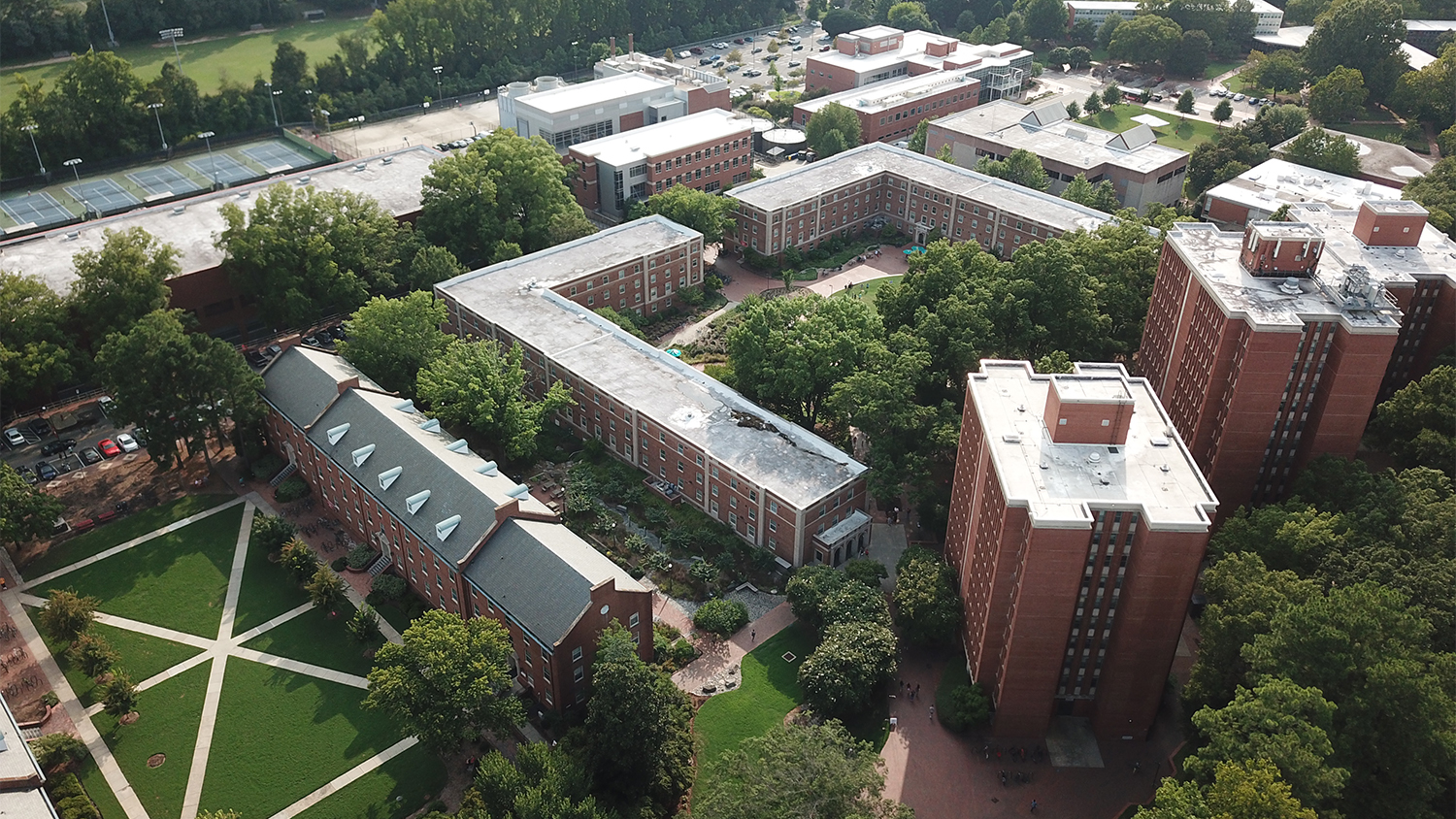 Aerial view of brick housing buildings on campus