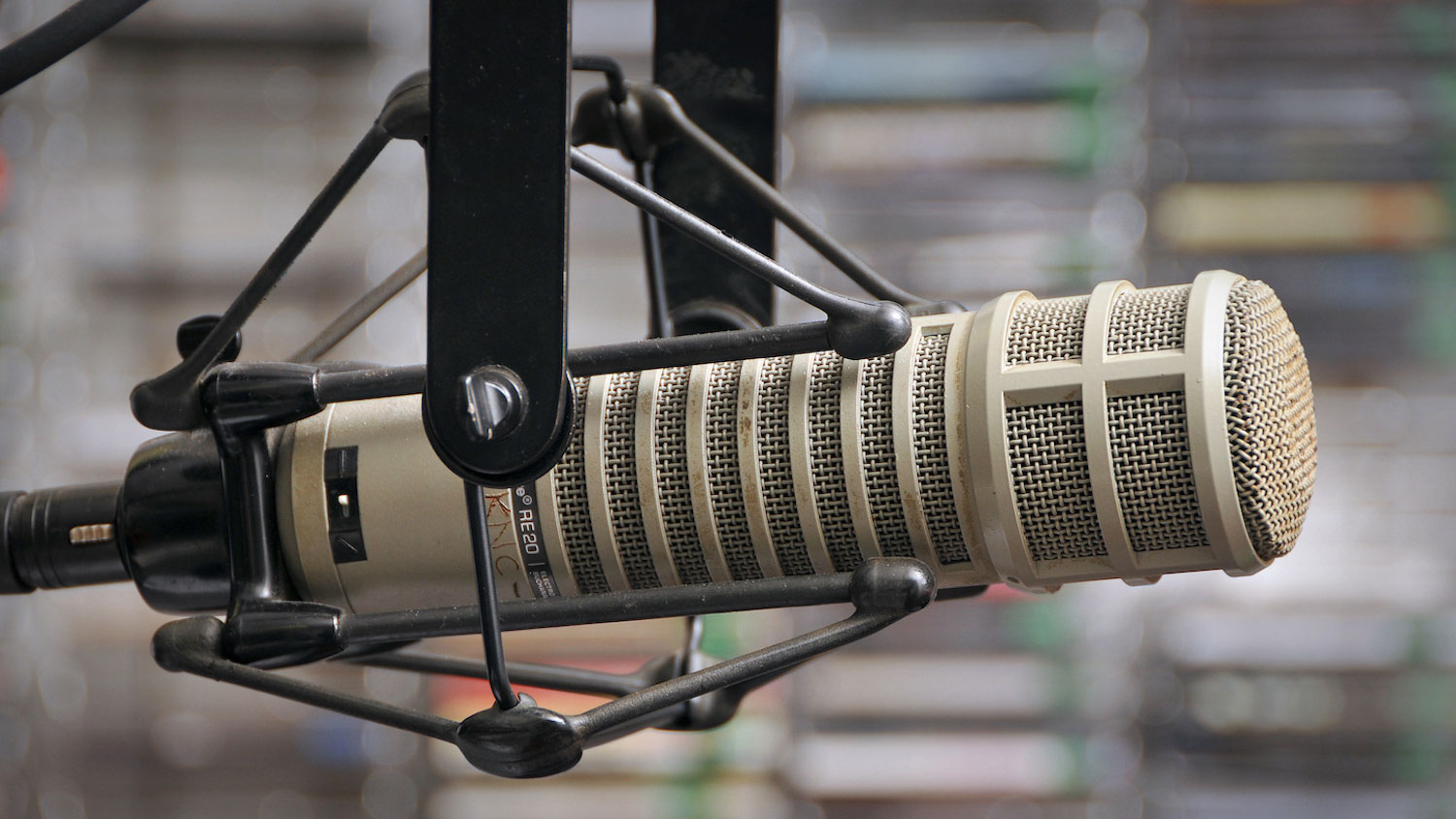 A close-up of a radio studio microphone
