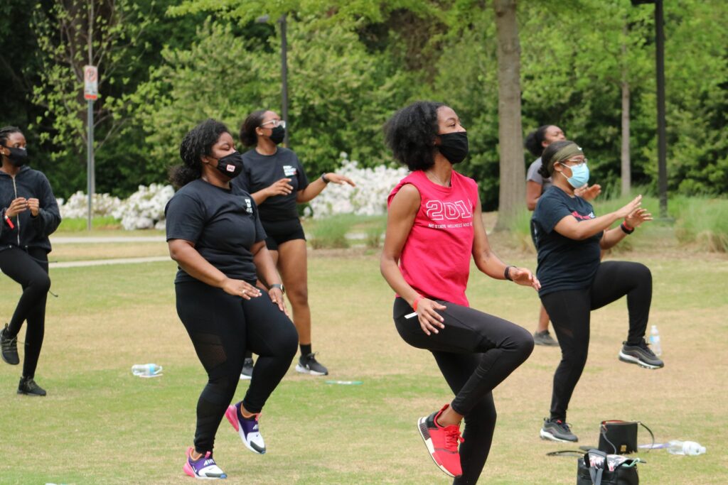 Students get moving on Stafford Commons as part of last year's PanAfrican Week Trap Fit event