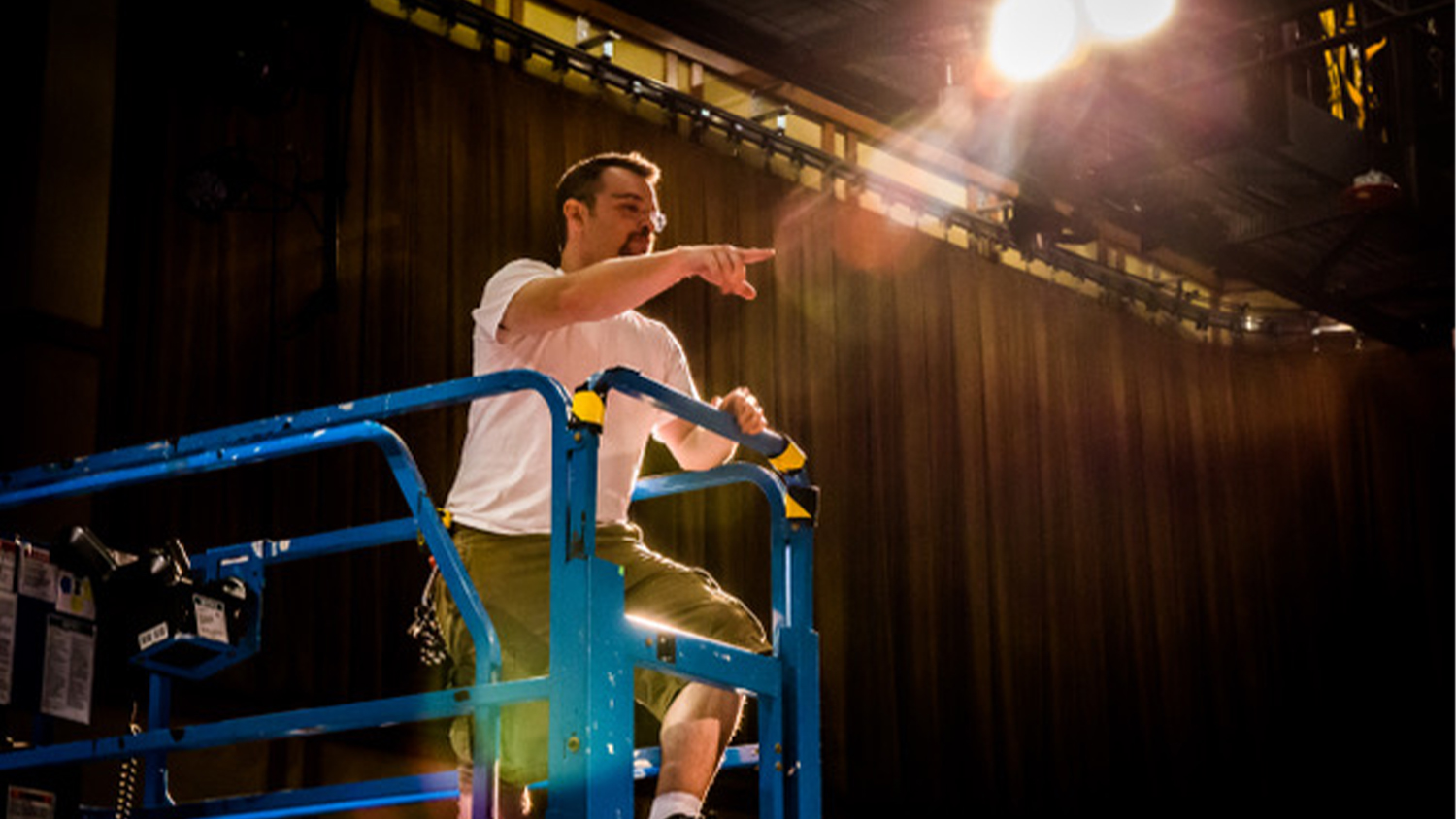 Joshua Reaves overlooking the set in Titmus Theatre. Photo by Nick Purdy.