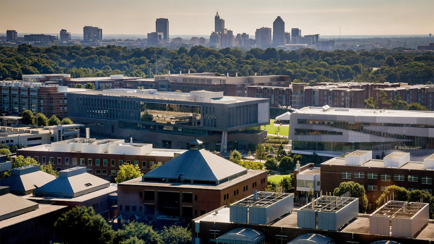 Aerial view of Centennial Campus with downtown Raleigh in the background