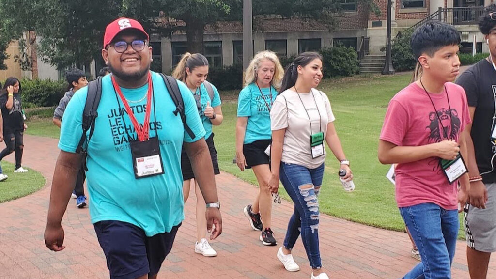 Juntos Summer Academy students and staff walking the NC State campus