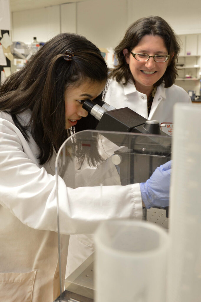 Dr. Cabrera mentoring a student in her lab at MIT Lincoln Laboratory