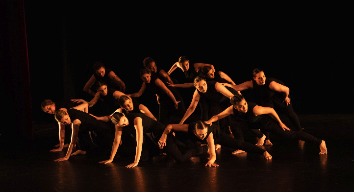 Dance students perform on a stage
