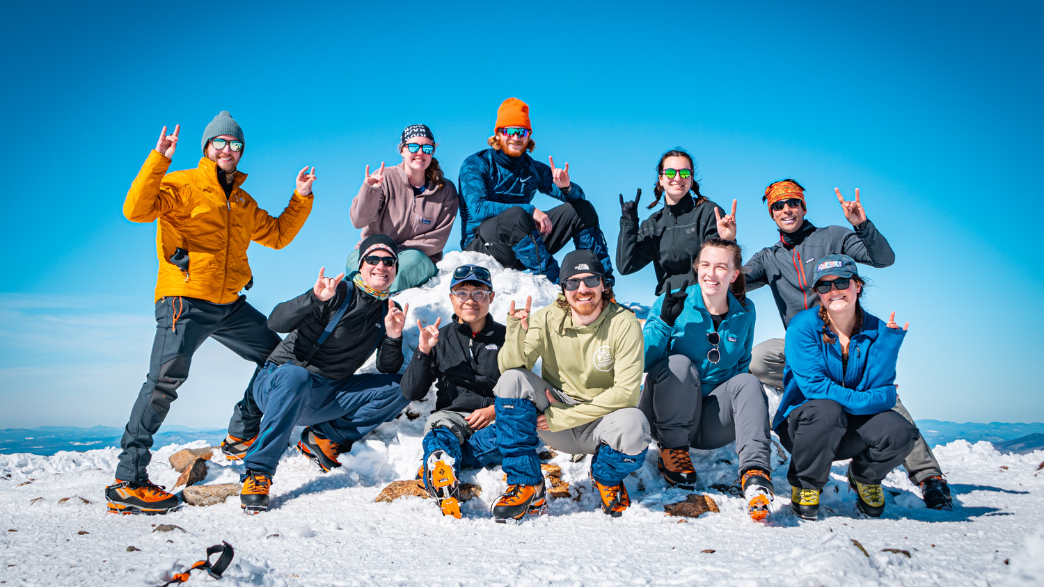 NC State Mountaineering students gather at a summit during last semester's ice climbing trip to the White Mountains of New Hampshire.