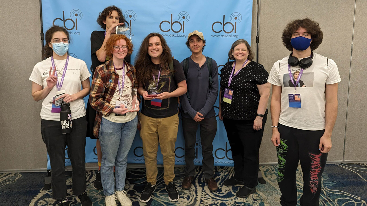 From left, Sophia Cunningham, Erie Mitchell, Claire Conklin, Rose Kelley, Nick Pinto, Jamie Lynn Gilbert and Spencer Grattan accepted awards for Best Podcast, Best Video Promo and Best DJ at the College Broadcasters, Inc. National Student Production Awards on Oct. 21 in Orlando.