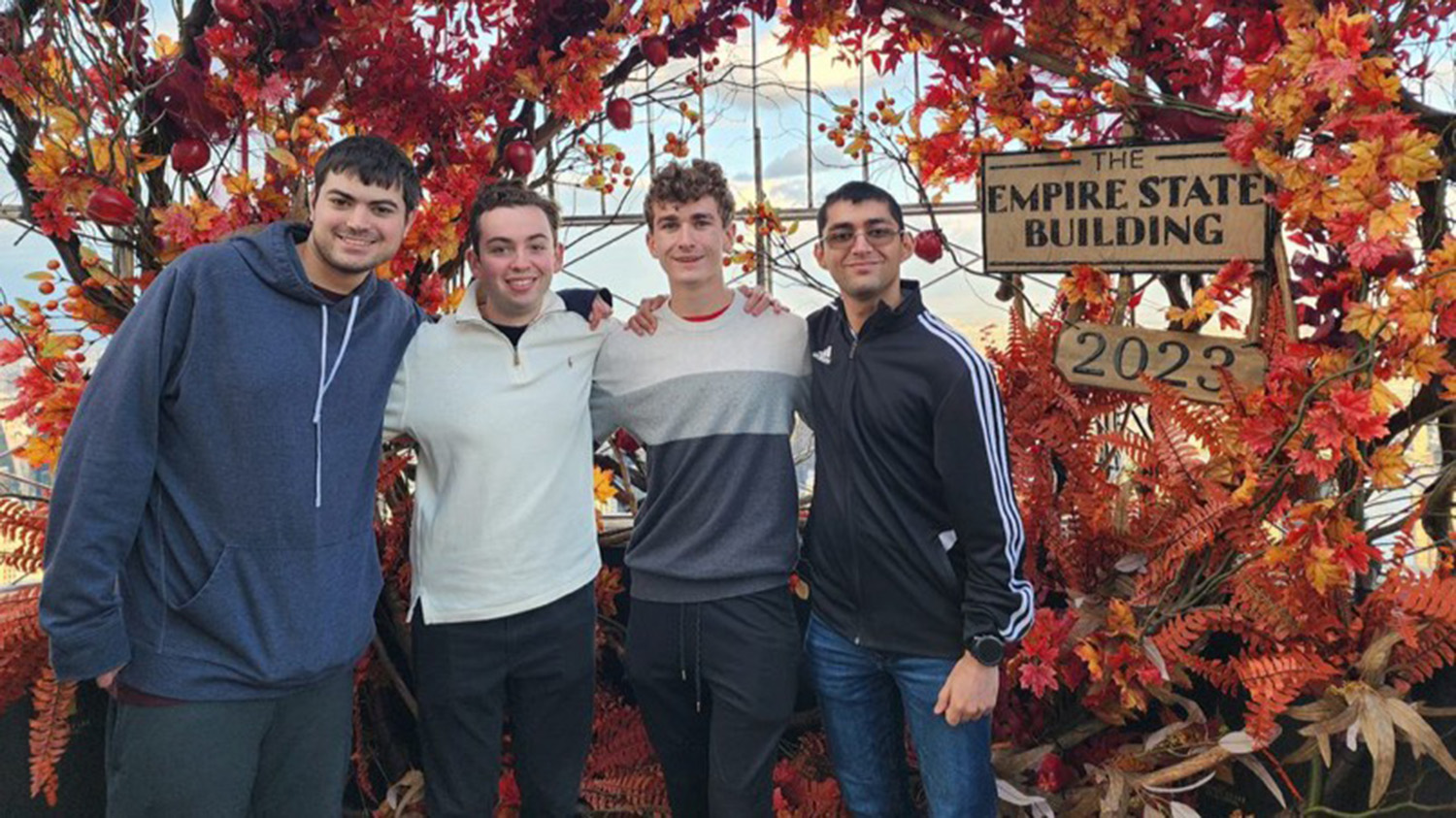 Pictured left to right: Hunter Brown, Patrick Finkbiner, Charlie Pletzke, and Kanv Khare stand together at the top of the Empire State Building.