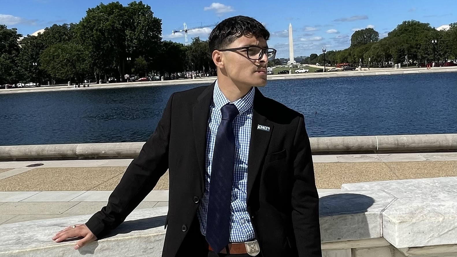 Jason Turcios, Public Policy Fellow for the Congressional Hispanic Caucus Institute (CHCI) in Washington D.C., stands with the Washington Monument in the background