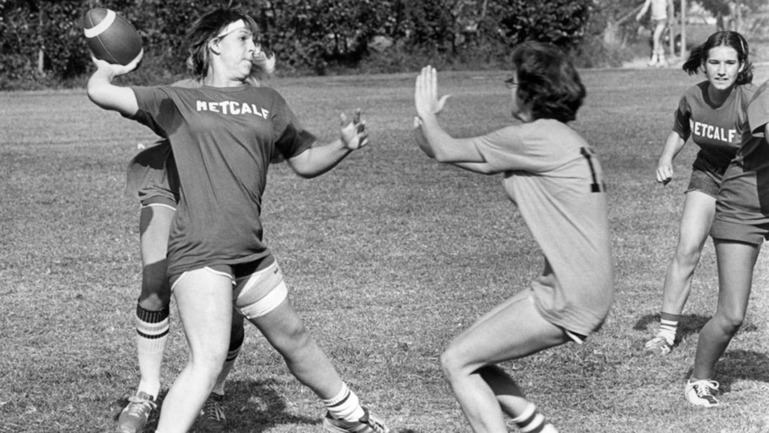 women playing intramural flag football in the 90s
