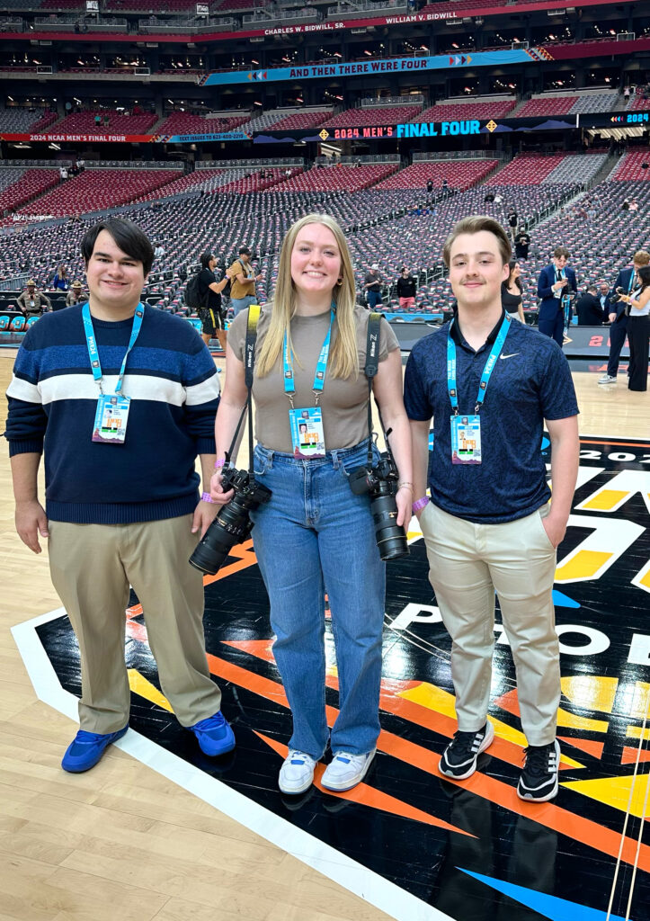 From left: Technician Assistant Sports Editor Noah Teague, Senior Staff Photographer Hallie Walker and Sports Editor Colby Trotter on the court at State Farm Stadium. 
