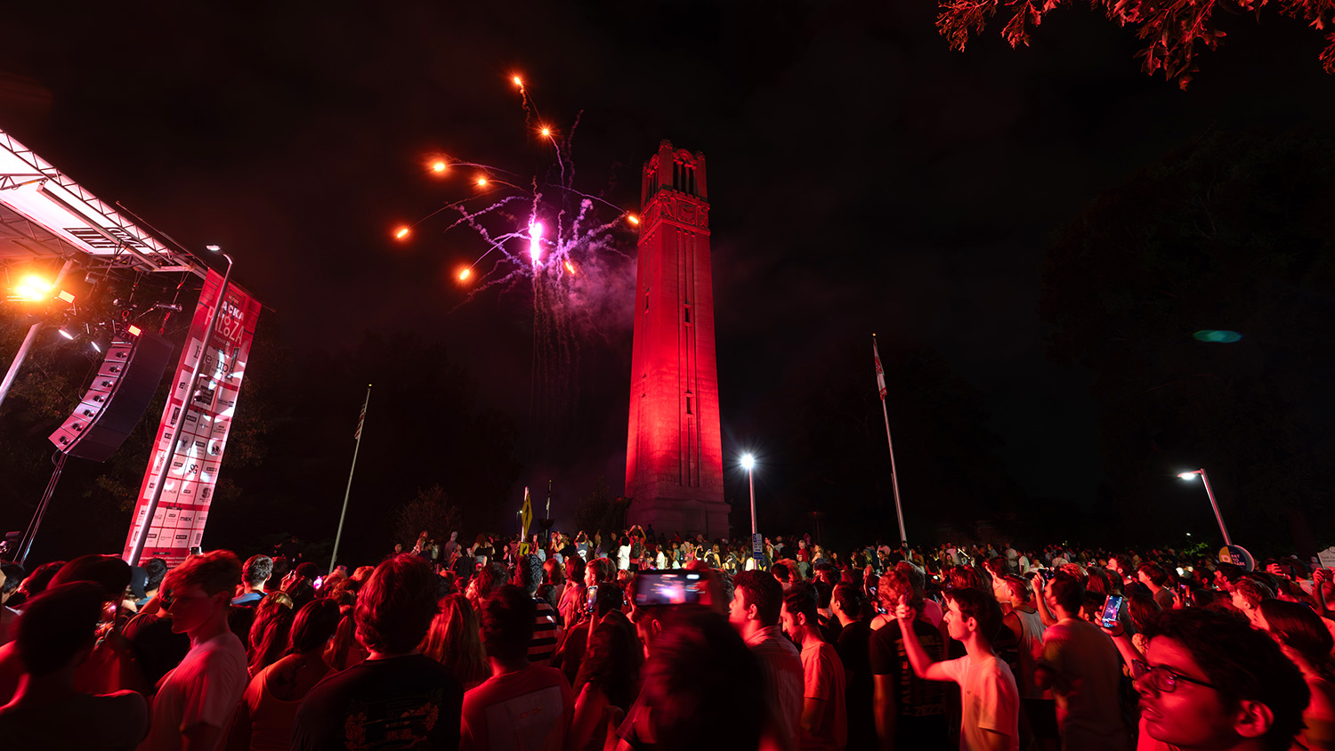Fireworks light up the sky behind the Belltower at Packapalooza.