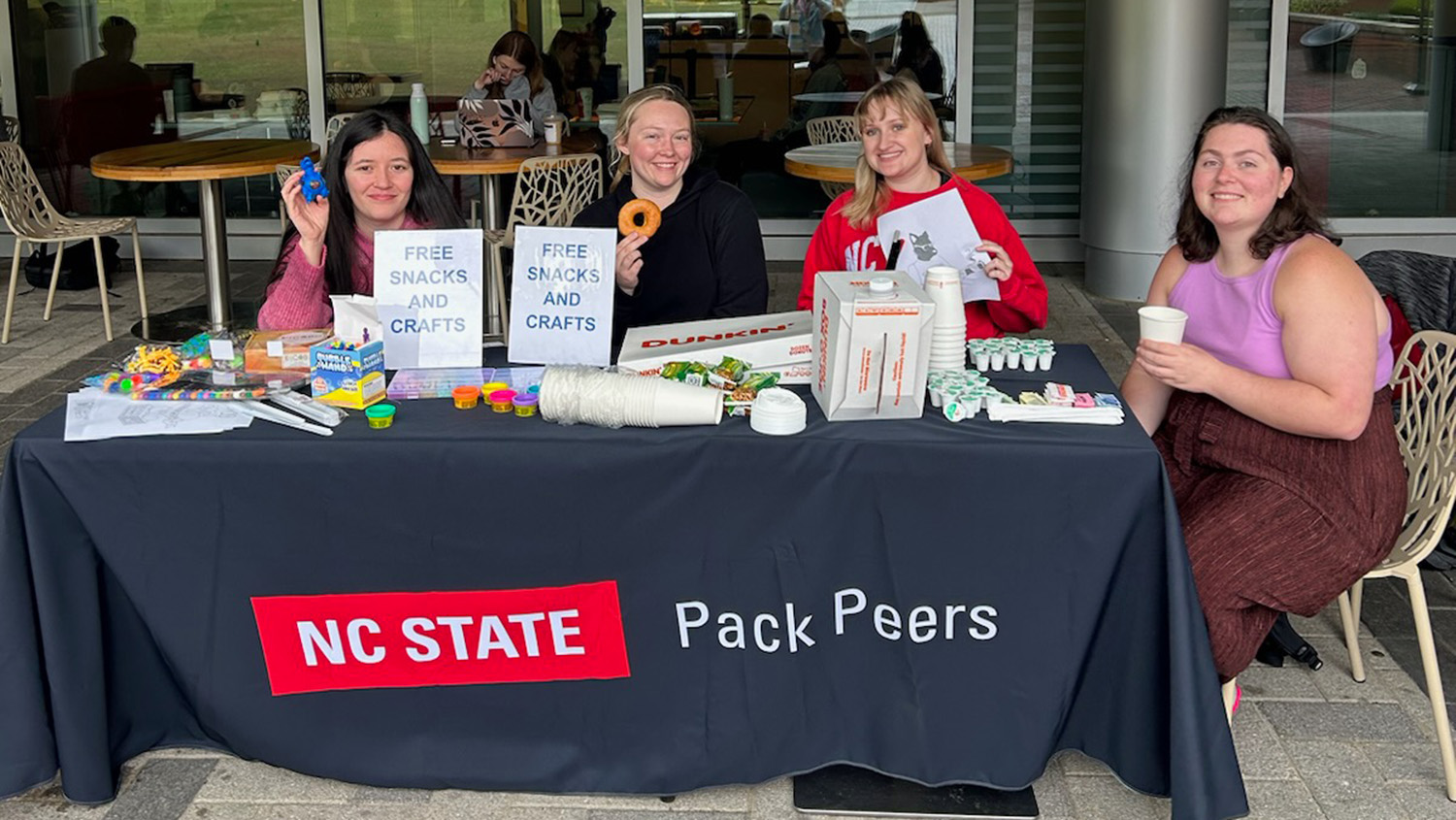 Pack Peers students tabling in front of Talley Student Union.