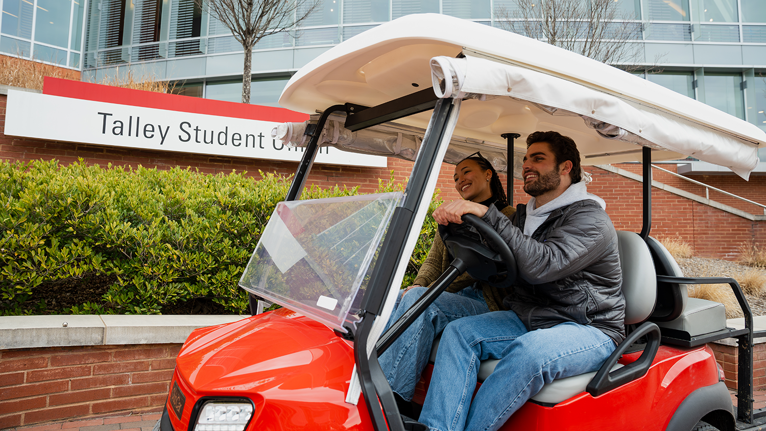 A Wolfpack Pick Up driver transports a rider to their destination.