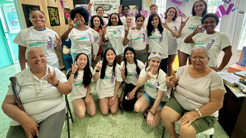 HON 398 students and course instructors proudly show off their new "Women of the Alianza de Mujeres Viequenses" t-shirts after meeting with that advocacy group in March of 2024.