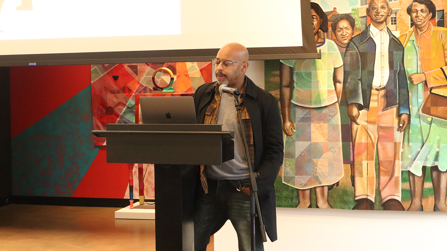 Carl Joe Williams speaks during an artist talk at the Gregg Museum of Art & Design.