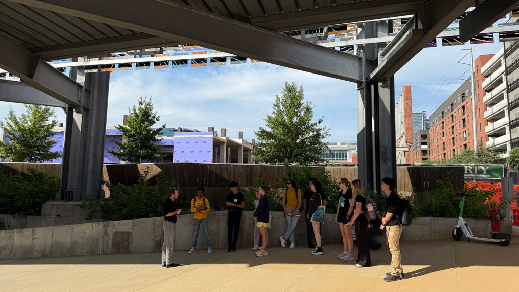 HON 398 "Sustainable Cities and Communities" students take a walking tour of downtown Raleigh with city planner and Senior Sustainability Strategist, Jason Hardin, before heading to Seattle, WA for their fall break.