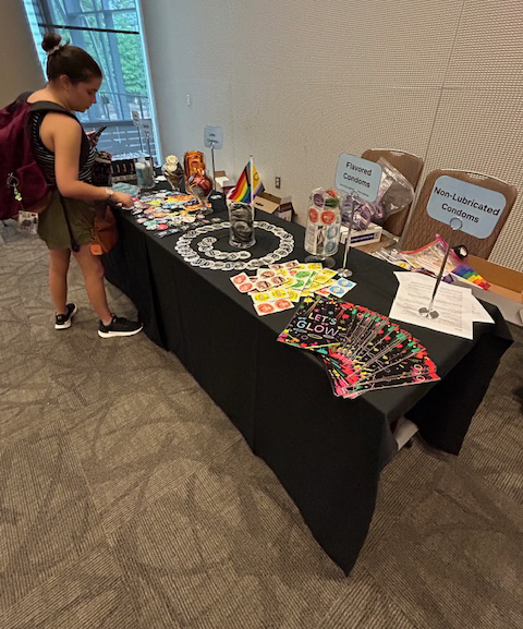 A student peruses free sexual health resources. 