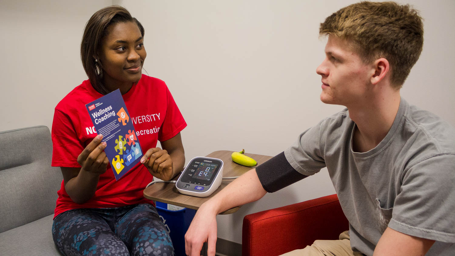 An NC State student works with a Wellness and Recreation wellness coach.
