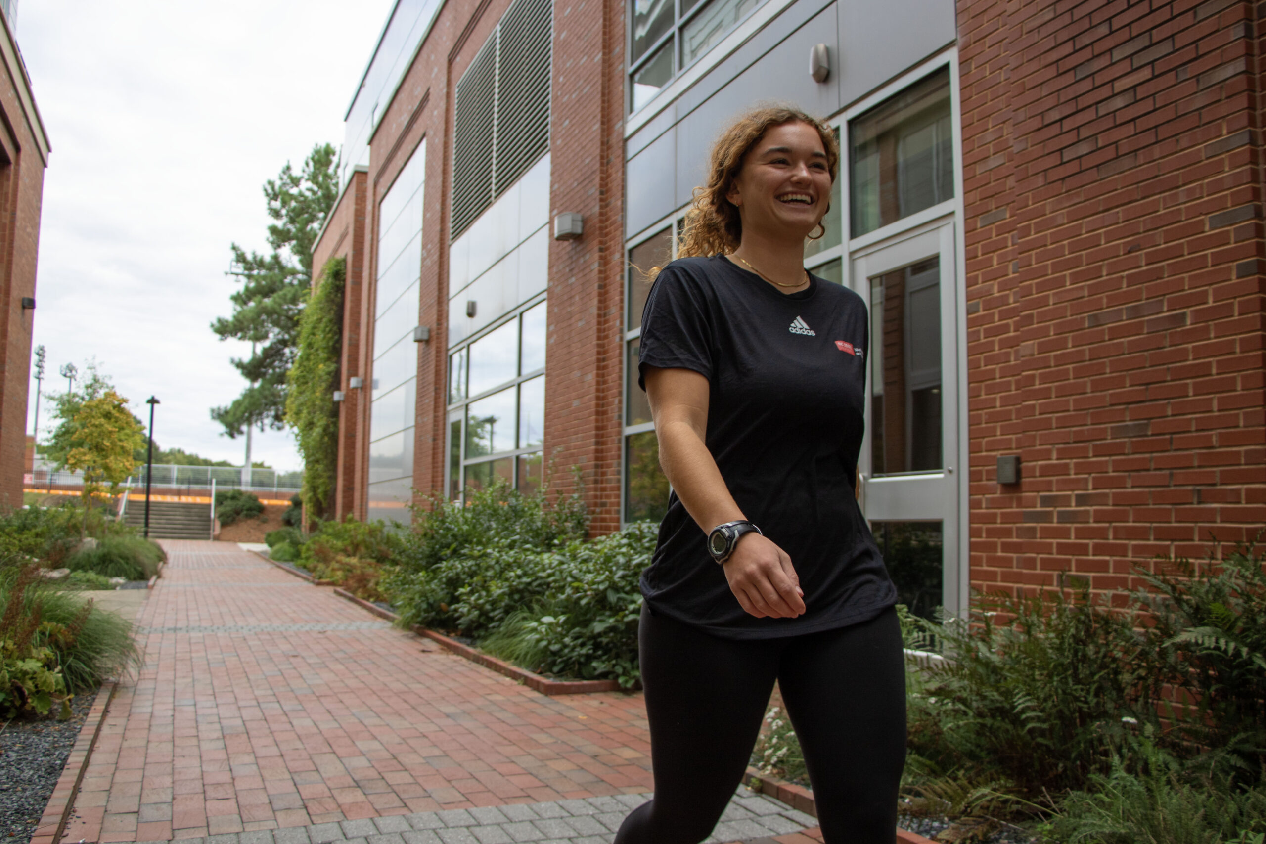 A student enters the Wellness and Recreation Center.