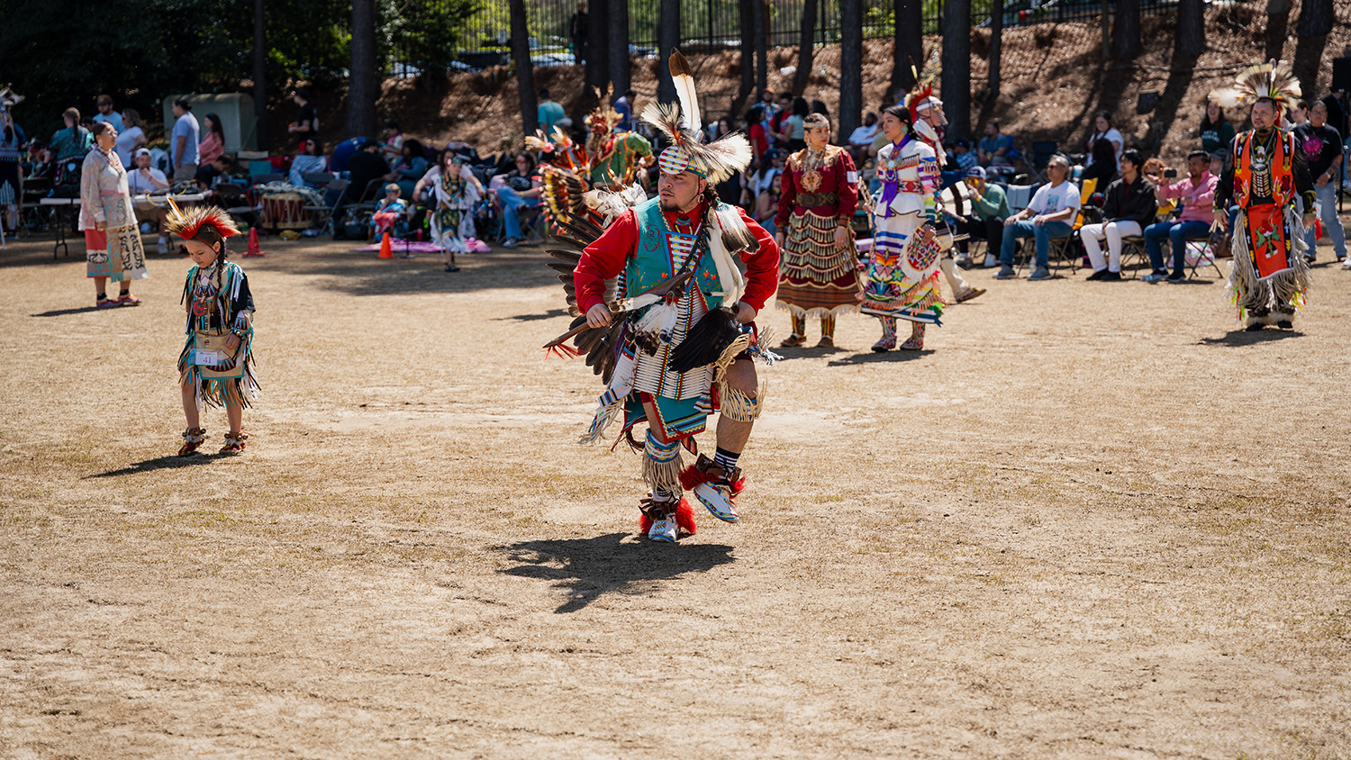 Native American dancers dance at NC State's 2024 powwow.