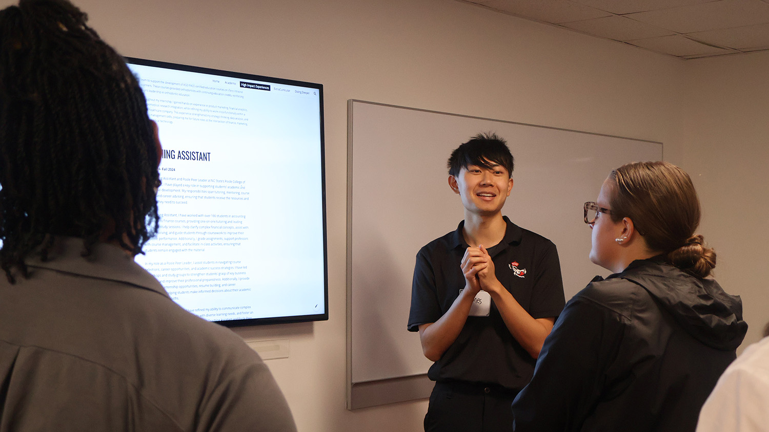 James Hung is pictured presenting his digital portfolio during the University Honors Program’s Senior Portfolio Showcase on April 7, thereby completing his requirements for the UHP.