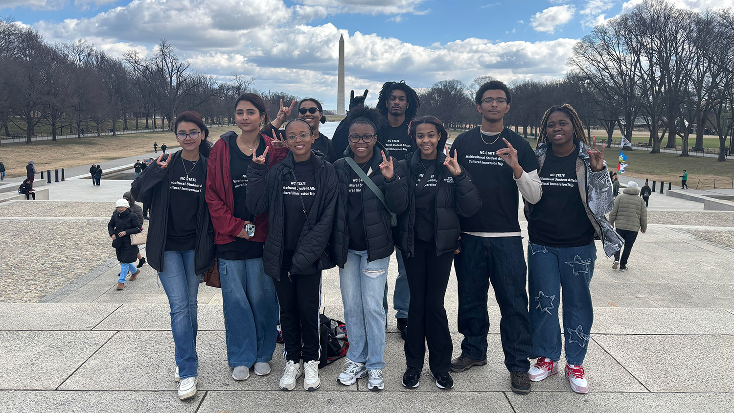 NC State students pose in front of the Reflecting Pool in Washington, D.C.