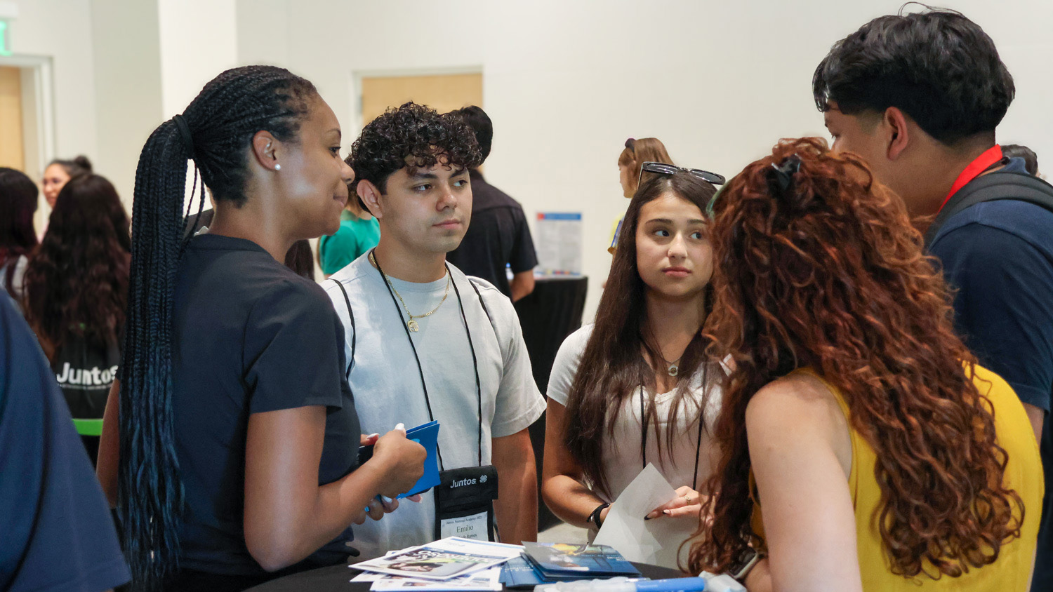 Juntos Students participate in a small group discussion.