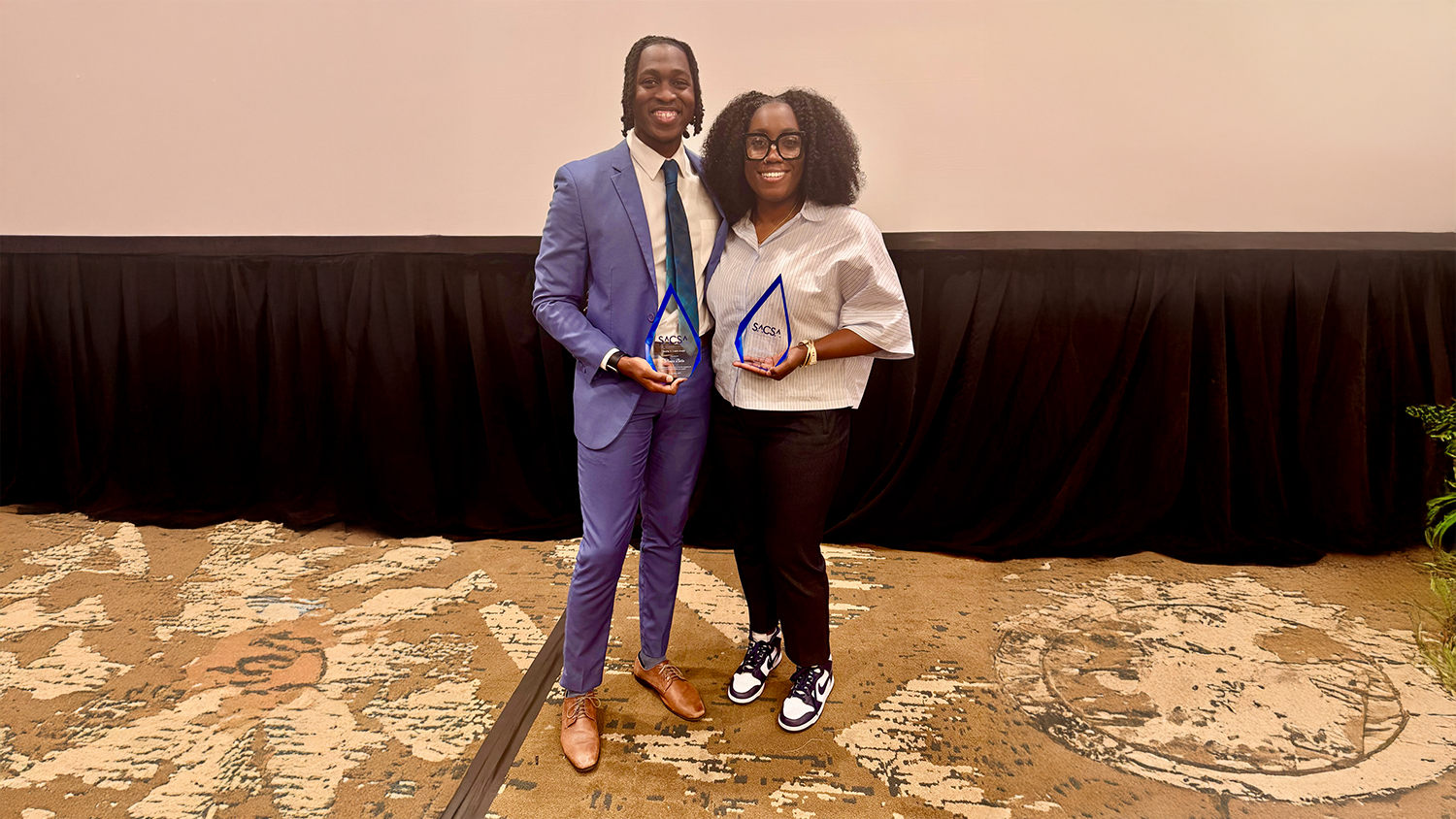 Trevis Belle, left, and Alliyah Floyd proudly display their SACSA awards.